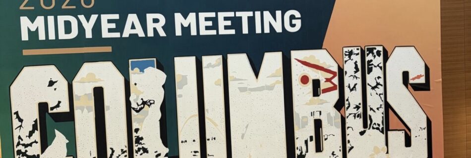 Large sign announcing the 2026 Midyear Meeting in Columbus, Ohio, with the word 'GLOBLOCKS' and the NAPA logo.