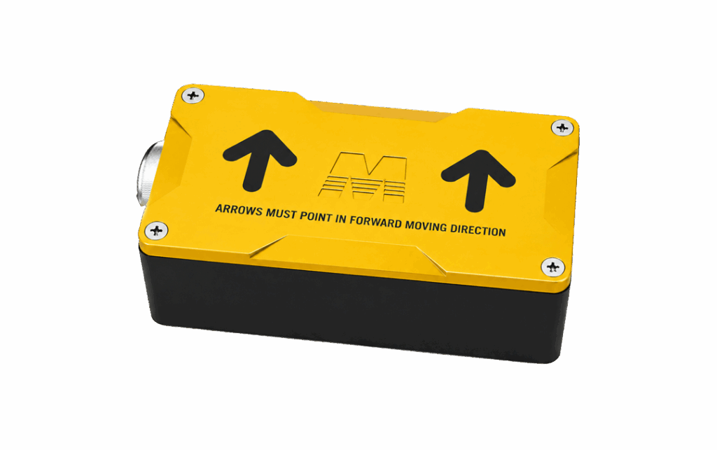 Yellow industrial device with two black up arrows and the text 'Arrows must point in forward moving direction' guiding forward movement.